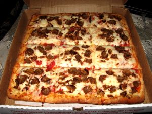 Pizza in the Finger Lakes region has thick crust and is cut into squares.